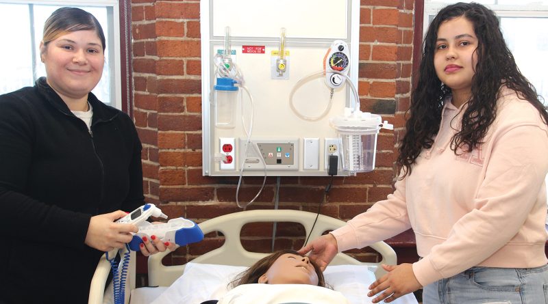 CNA students Marianna Navarro Santiago, left, and Dashira Nazario